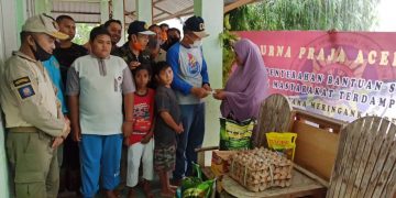 Purna Praja Aceh Bagi Sembako untuk Masyarakat Terdampak Covid-19