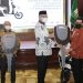 Gubernur Nova Serahkan Motor Listrik untuk 23 Kabupaten Kota