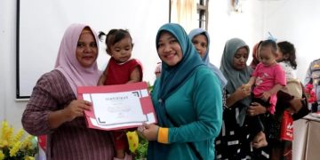 Pj Ketua TP PKK Aceh Besar Hadiri Pemberian Apresiasi untuk Anak di Puskesmas Darul Kamal