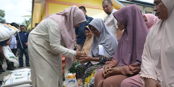 Pj Ketua TP PKK Aceh Launching Penyaluran Cadangan Pangan Pemerintah Tahap ke-3 di Blang Bintang